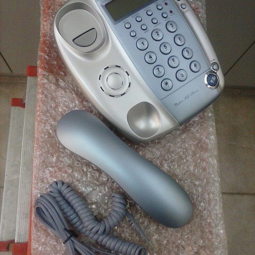 Wired telephone with caller ID, silver and blue