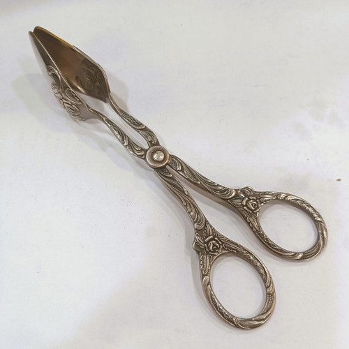 Sugar tongs used, Rococo Revival style, mid-20th century
