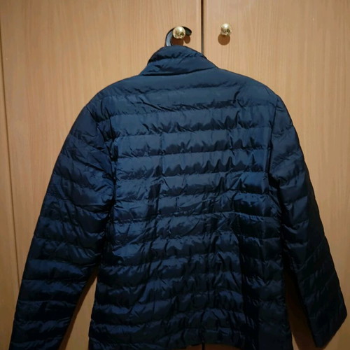 New dark blue quilted jacket.
