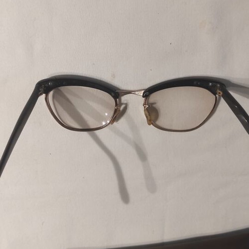 Vintage eyeglasses used, gold color with old case