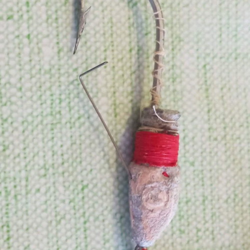 The Weezel Casting Feathered Minnow vintage fishing lure used