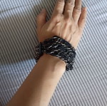 Bracelet new with pearls and chains, gray and black