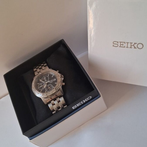 Seiko Quartz Japan Chronograph Alarm watch used, blue dial, silver bracelet