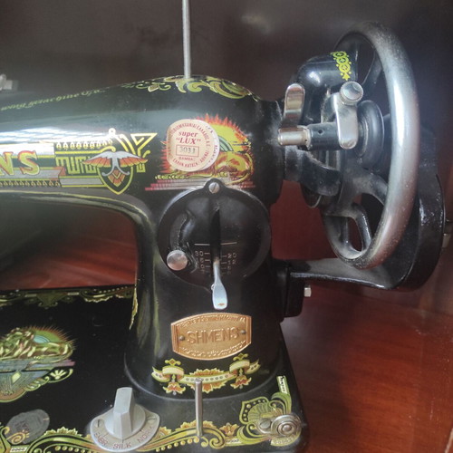 Shmens sewing machine used, antique collectible