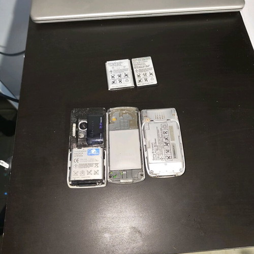 Old collectible cell phones used, without cover, with battery