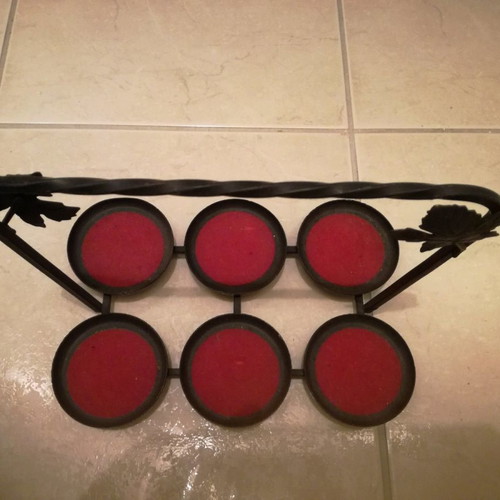 Metal candle holder for six tealights used