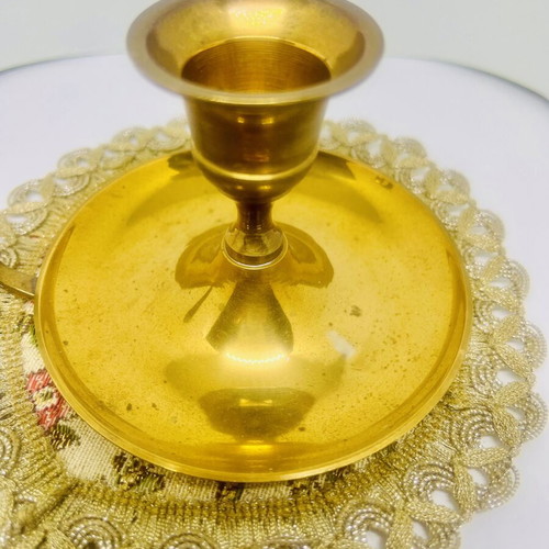 Vintage brass candlestick with handle and drip plate, used