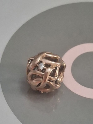 Pandora charm rose gold decorated with zircon stones like new