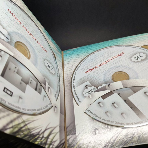 Thanos Mikroutsikos Taxidevontas me tin Kyriakatiki CD+DVD used, entechno