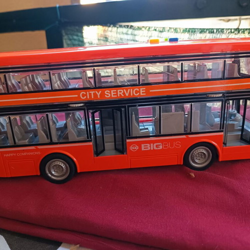Toy bus used with lights and sounds