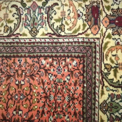 Handmade silk rug used with classic design and warm colors