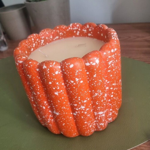 Decorative funky candle like new, bright orange