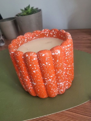 Decorative funky candle like new, bright orange