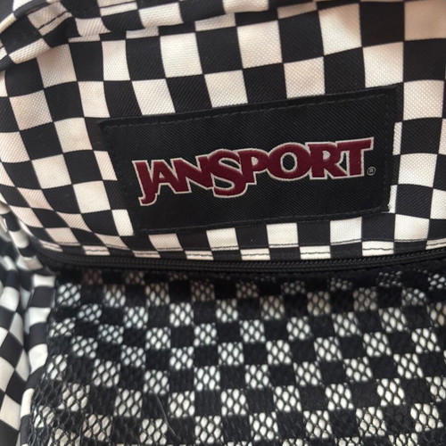Jansport black and white checkerboard backpack with laptop compartment