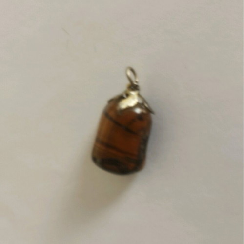 Tiger's Eye pendant like new with silver setting