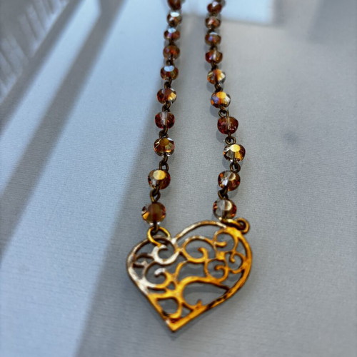 Necklace with heart design like new