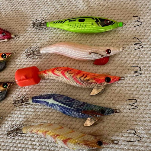 Squid jigs like new, set of 18 branded lures including Yamashita, Yo Zuri