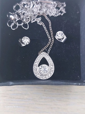 Pendant and earrings silver plated like new
