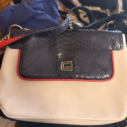 Robert Cavalli bag used with leather damage inside locker