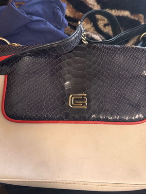 Robert Cavalli bag used with leather damage inside locker