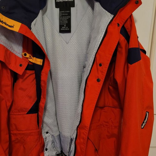 Ski and mountaineering jacket like new, red with blue details, medium