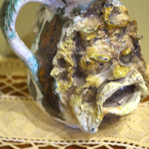 Decorative vintage jug used with mascarons
