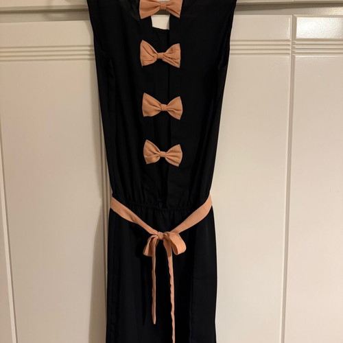 Black dress like new with peach bows and belt