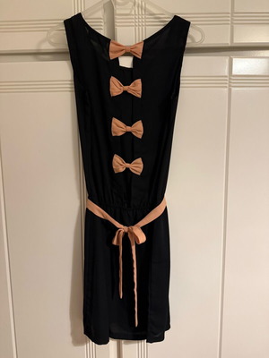 Black dress like new with peach bows and belt