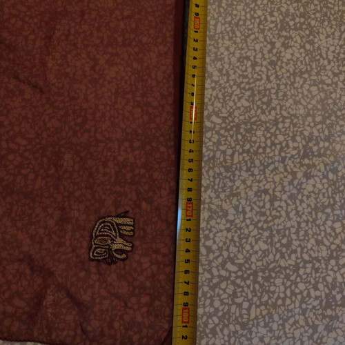 Long brown scarf used with embroidered elephants and paisley