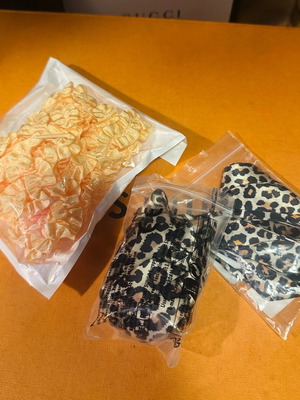 Three pairs of shoelaces new, brown and yellow