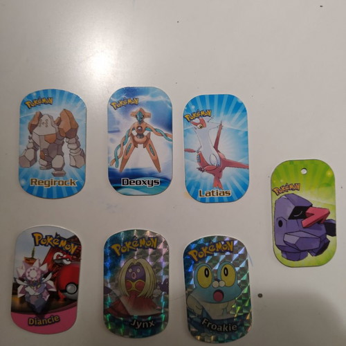 Pokemon and football tags used, set of 10 pieces