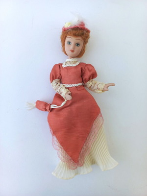 Small porcelain doll like new