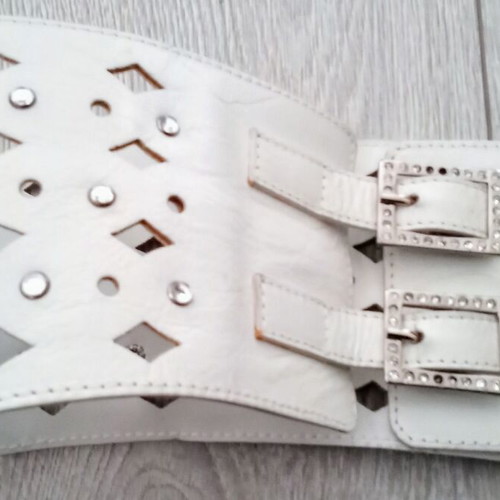 Wide belt used white with rhinestones and diamond pattern
