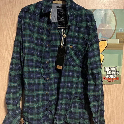 Checked shirt new size M