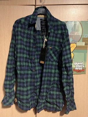 Checked shirt new size M