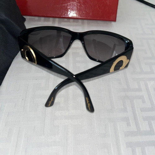Salvatore Ferragamo sunglasses new, black with gold logo