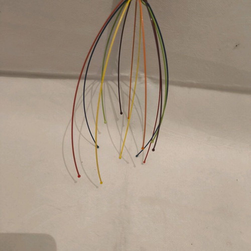 Head massage brush like new, multicolored