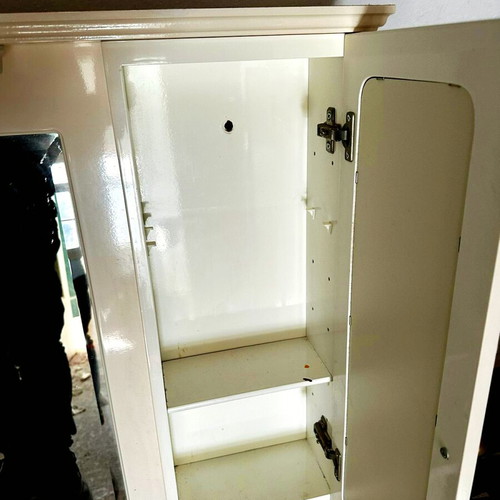 Bathroom cabinet with mirror hanging used