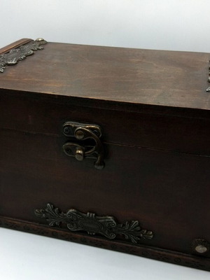 Vintage wooden box with decorative elements like new
