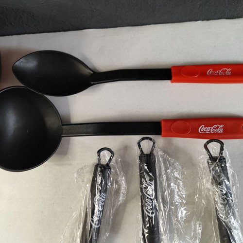 Coca Cola promotional set used with bag, kitchen tools, sunglasses, ball