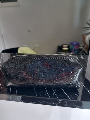 YSL toiletry bag like new, black and silver