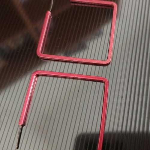 Square earrings used, missing fasteners