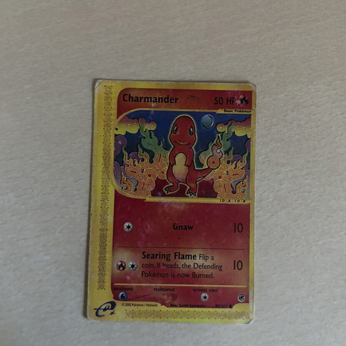 Pokemon Charmander card used, rare condition