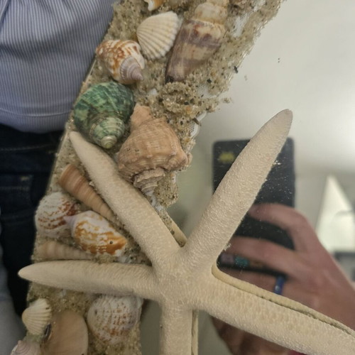 Oval mirror decorated with shells like new, handmade