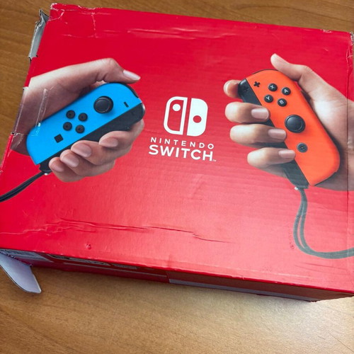 Nintendo Switch 32GB red/blue used, original box with wear