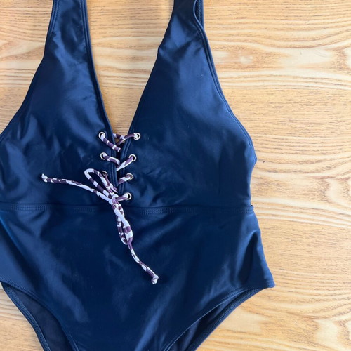 Black one-piece swimsuit with animal print cord, size L, like new
