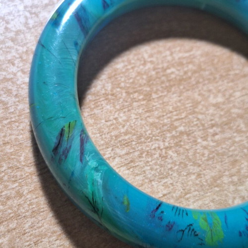 Petrol resin bracelet with flower designs like new