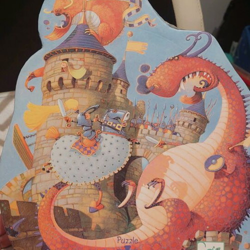 Djeco puzzle like new, 54 pieces with castle and dragons theme