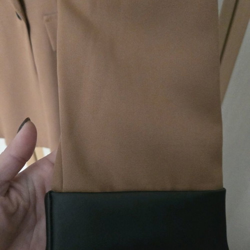 Tan jacket with leather sleeves new, size M