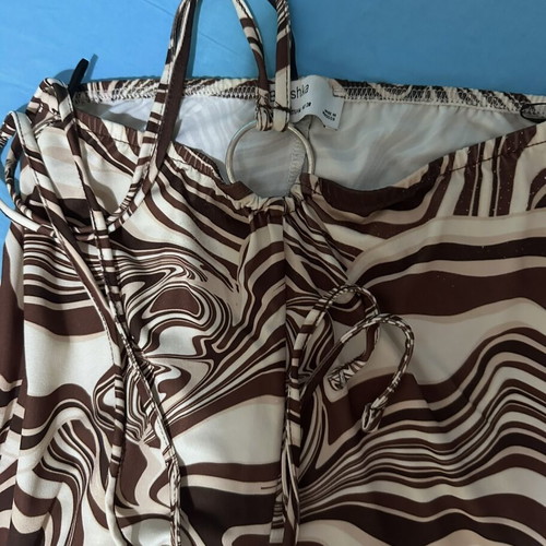 Bershka flared pants with pattern, size medium, like new, beige and brown
